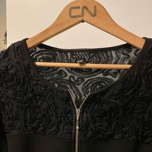 Sophisticated Women's Black Cardigan with Floral Texture on the top.